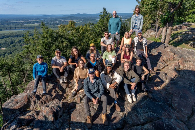 The class of 2025 at the summit of Mt. Skinner in South Hadley