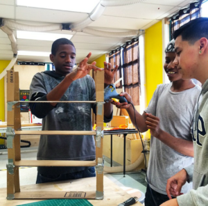 After learning about ecology, nutrition, alternative growing systems and entrepreneurial concepts, students constructed a scale model of the hydroponic systems they have now built and planted.