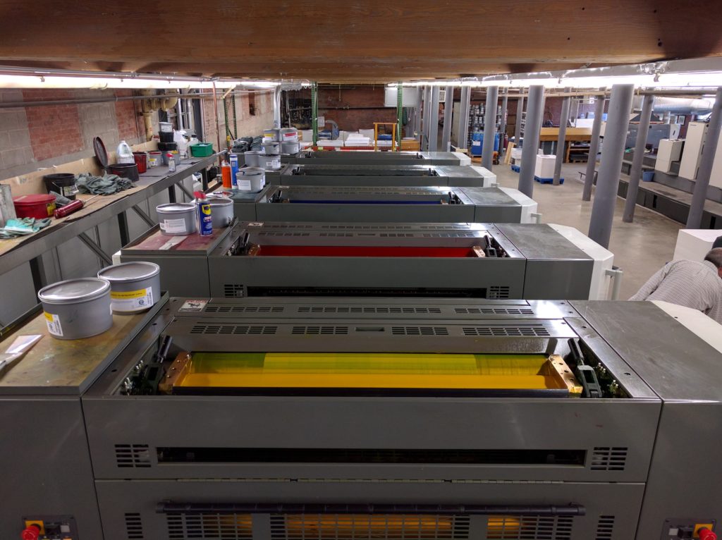 This high-tech full color press is in the basement of the brick industrial building that houses Hadley Printing and was used to print the covers.