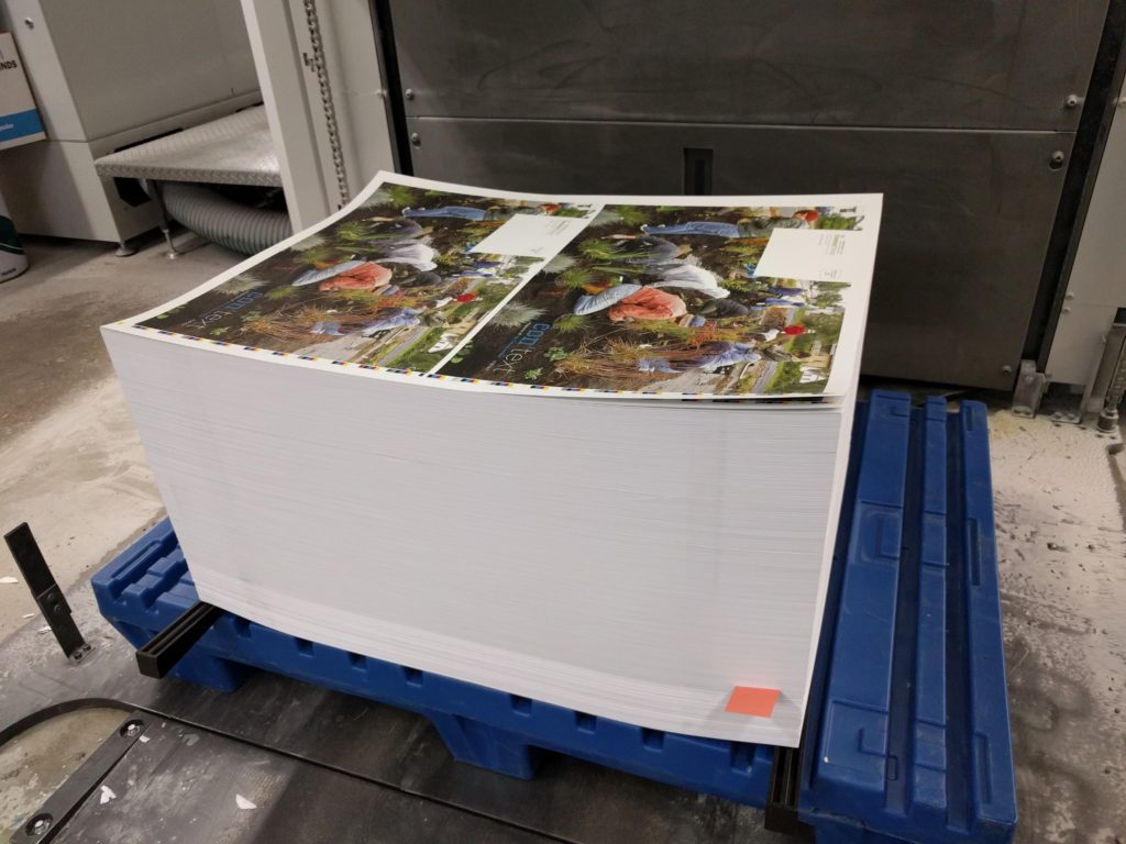 The final stack of covers ready to be cut and folded.