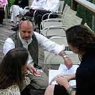 Jonathon Ellison '94 (center) speaks to students after formal project presentations.