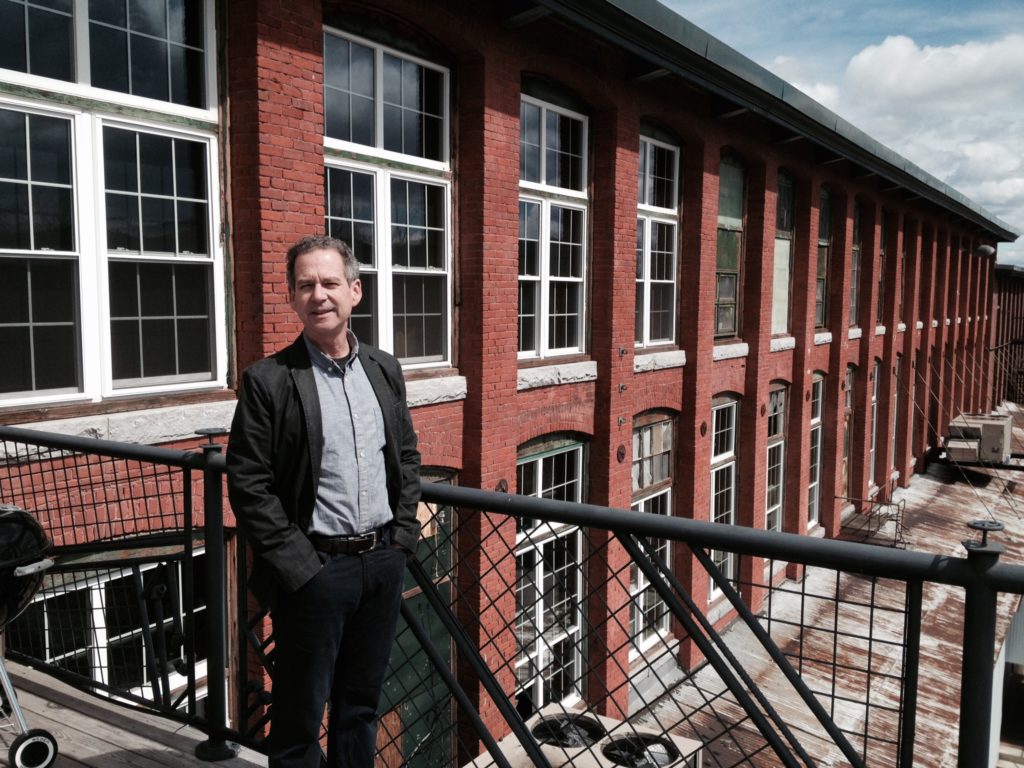 Ken Botnick '79 outside Mill 180. Conway's new Easthampton facility is on the second floor.