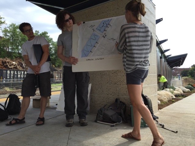 Max Madalinsky 16, Susan Schen 16, and Allison Gramolini 16 presenting their analysis of a section of Holyoke, MA at the newly constructed Holyoke train station during orientation week. 
